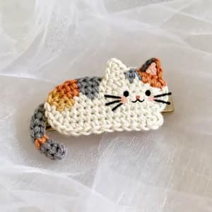 Tucked-Paws Calico Cat Brooch — view 2